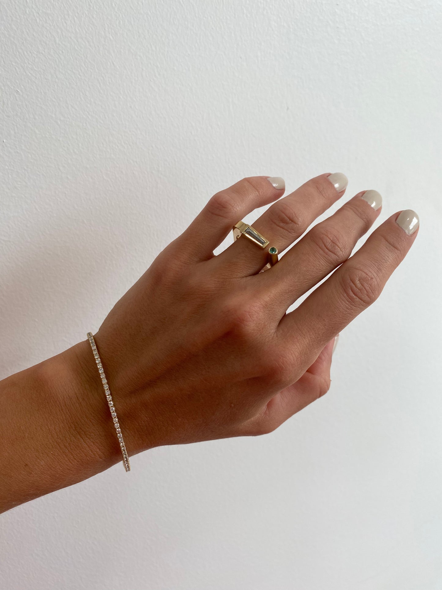 Tapered Baguette Diamond Emerald Ring