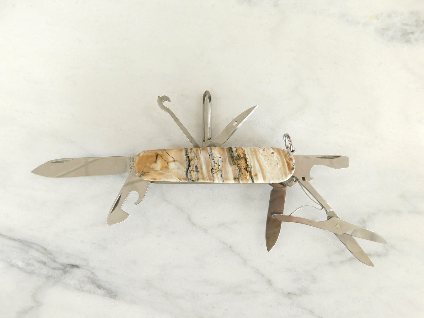 Fossilized Woolly Mammoth Swiss Knife