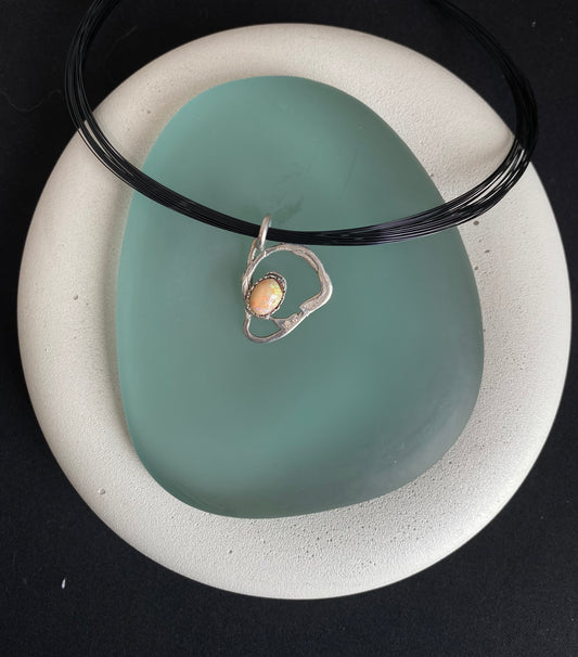 Free form silver and opal pendant